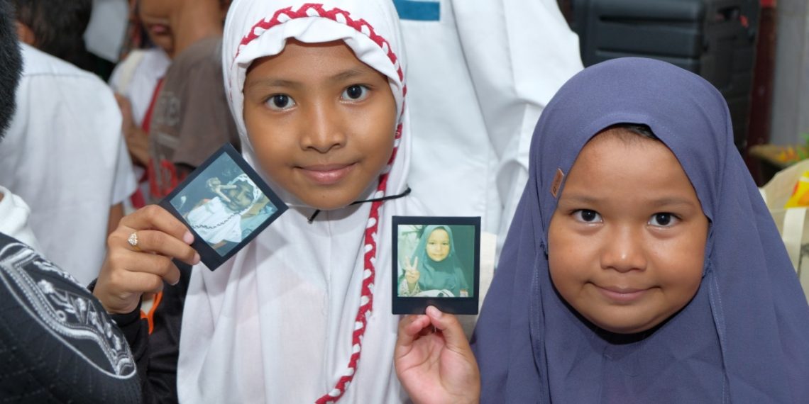 Semarak Suasana Berkat Selembar Foto Instan