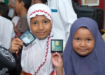 Semarak Suasana Berkat Selembar Foto Instan