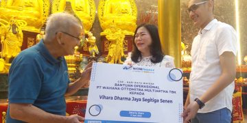 Wom finance Bagikan Paket Sembako